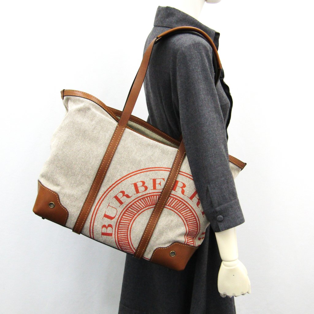 Buy & Consign Authentic Burberry Brown Canvas Leather Tote Bag at The Plush Posh