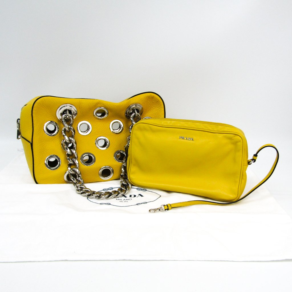 Buy & Consign Authentic Prada Yellow Vitello Daino Leather Grommet Chain Shoulder Bag at The Plush Posh