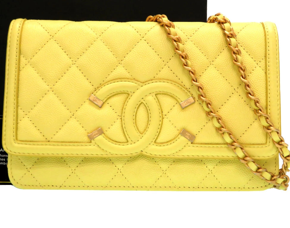 Buy & Consign Authentic Chanel Caviar Quilted CC Filigree Wallet On Chain WOC Yellow at The Plush Posh