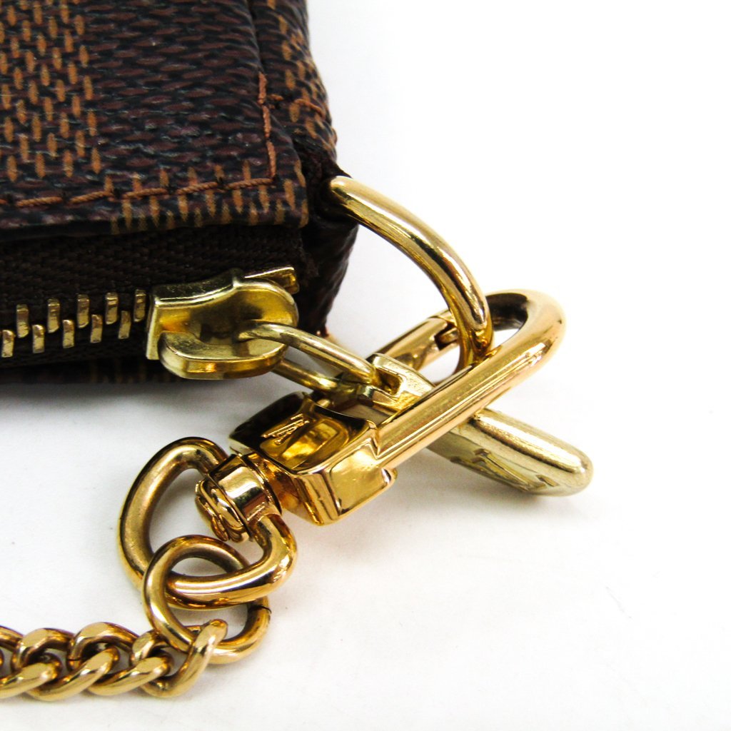 Buy & Consign Authentic Louis Vuitton Damier Ebene Mini Pochette Accessories at The Plush Posh