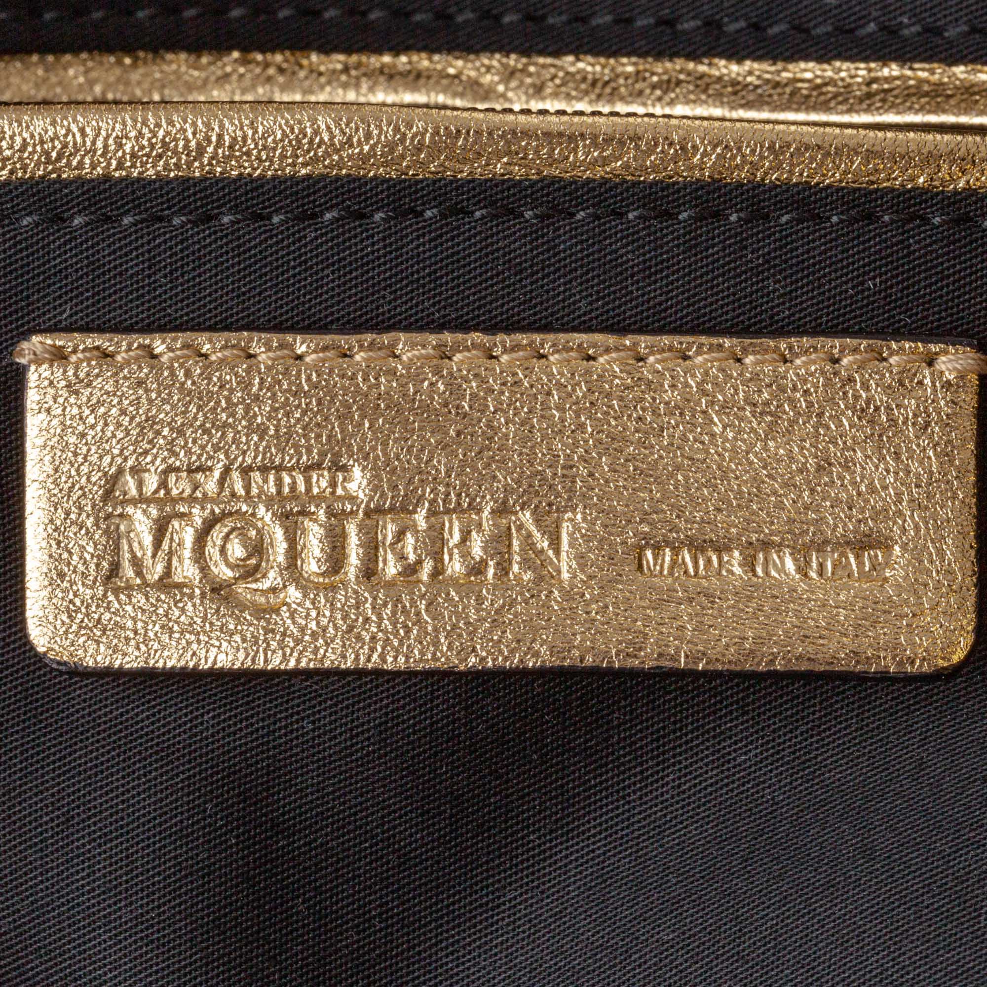 Buy & Consign Authentic Alexander Mcqueen CalfSkin De Manta Clutch Bag Gold at The Plush Posh